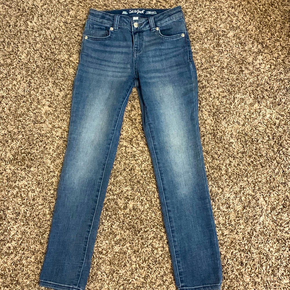 The brand is Cat & Jack, color blue and size 12.